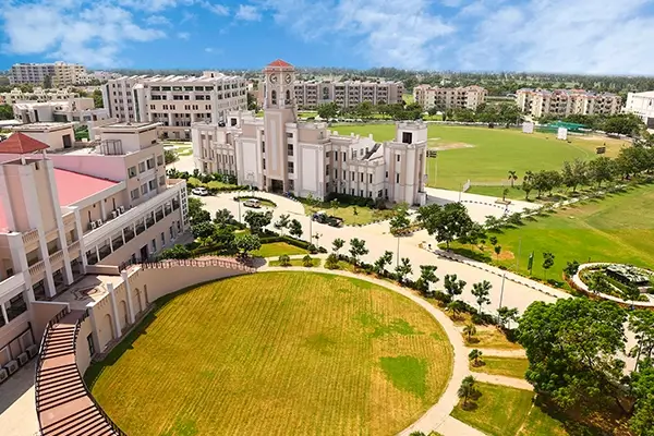TMU campus pavilion and green sports field